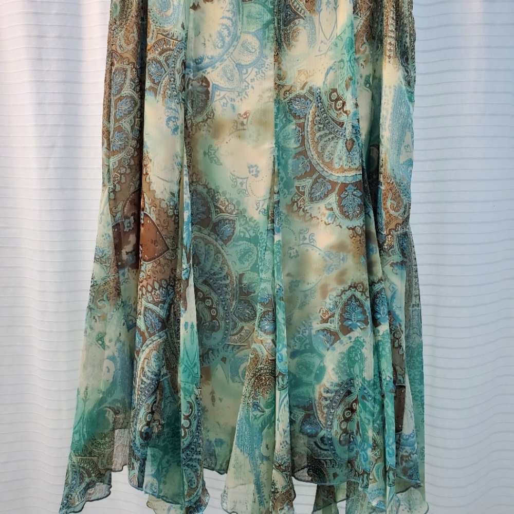 Dressbarn: size 10 asymmetrical turquois,, cream, brown pattern skirt